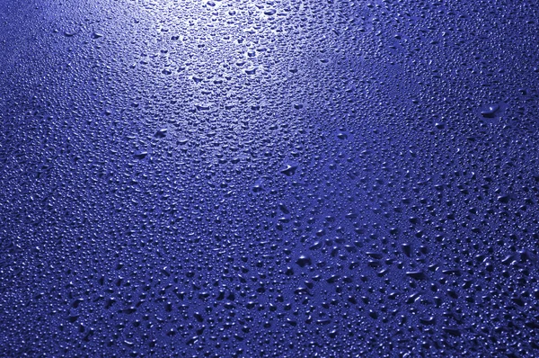 Imagen de superficie azul con gotas de primer plano — Foto de Stock