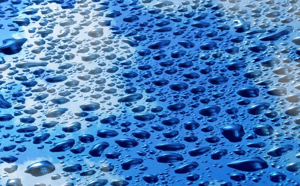 Imagen de superficie azul con gotas de primer plano — Foto de Stock