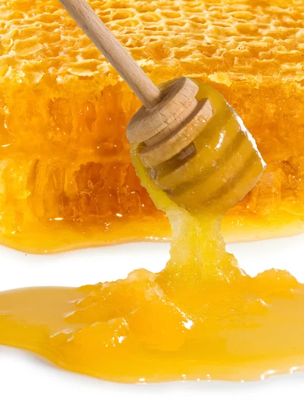 Image of honeycomb and honey close seup — стоковое фото