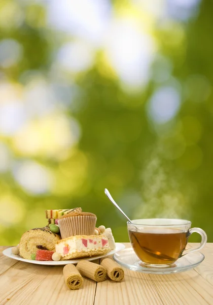 Imagen de primer plano del té y los dulces —  Fotos de Stock