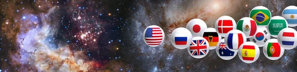 星空を背景に世界各国の旗のアイコンがクローズアップされ — ストック写真