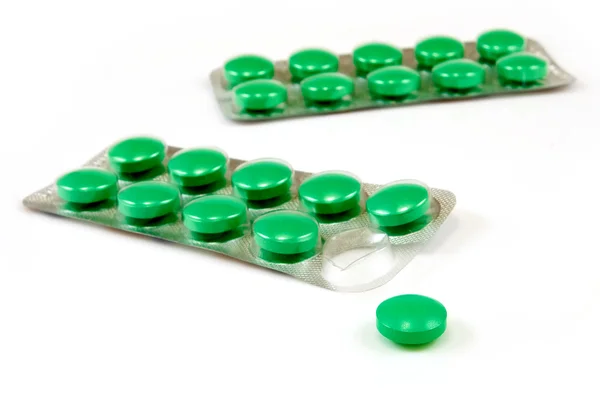 Isolated image of green pills on white background — Stock Photo, Image