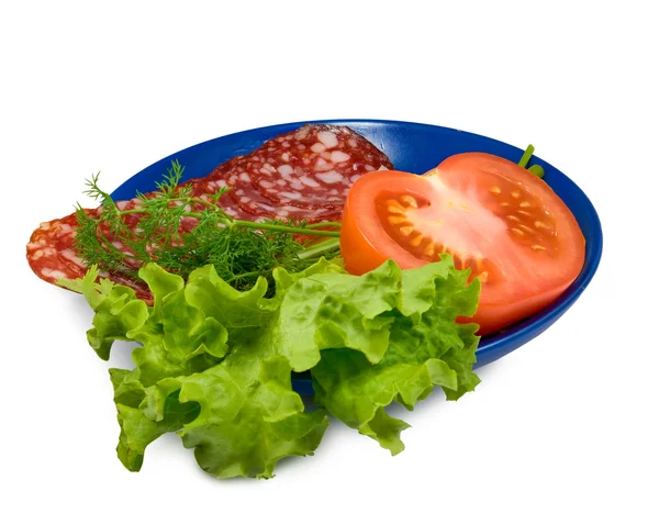 Plate with herbs, sausage and tomato — Stock Photo, Image