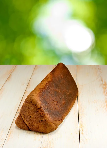 Bread on a green background — Stock Photo, Image