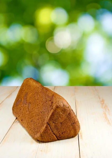 Bread on a green background — Stock Photo, Image