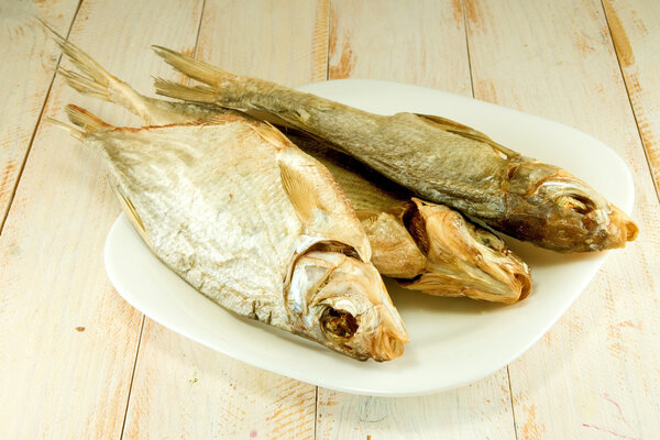 dried fish on a plate