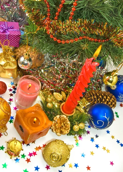 Lighted candles on the Christmas tree background closeup — Stock Photo, Image