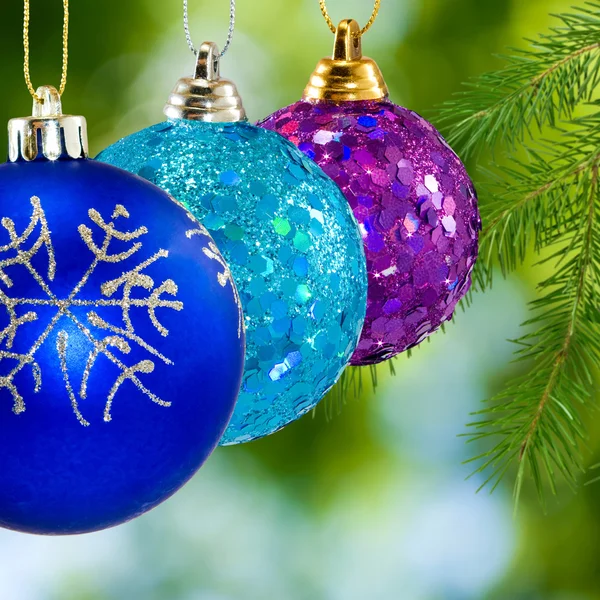 Christmas decorated balls on a green background — Stock Photo, Image