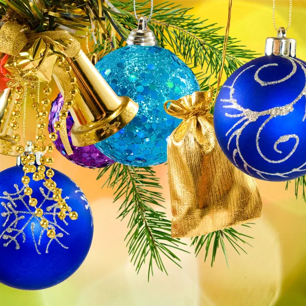 Christmas decorations on a yellow background — Stock Photo, Image