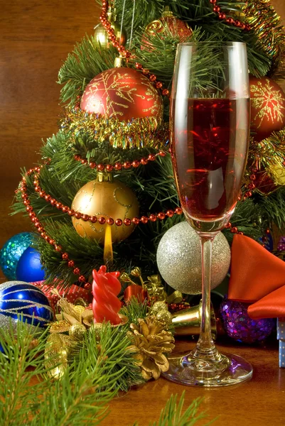 Christmas tree, candle and glass of wine — Stock Photo, Image