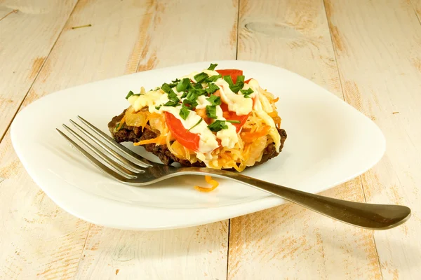 Tasty cutlets on the wooden table — Stock Photo, Image