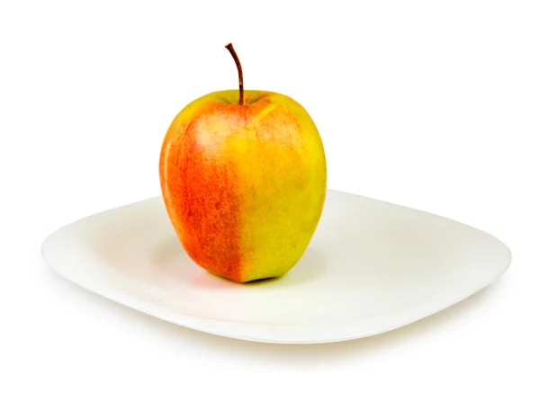Apple on a plate — Stock Photo, Image