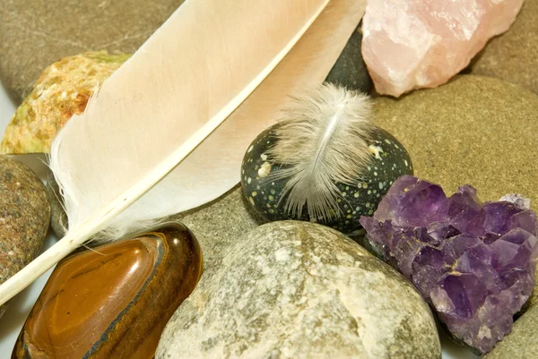 Image of various stones and feather closeup — Stock Photo, Image