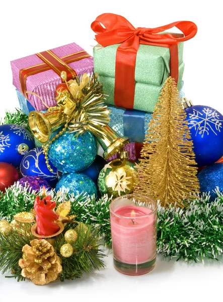 Different Christmas dekorations and boxes with gifts — Stock Photo, Image