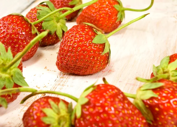 Image of ripe and tasty strawberries on wooden table closeup — Stock Photo, Image