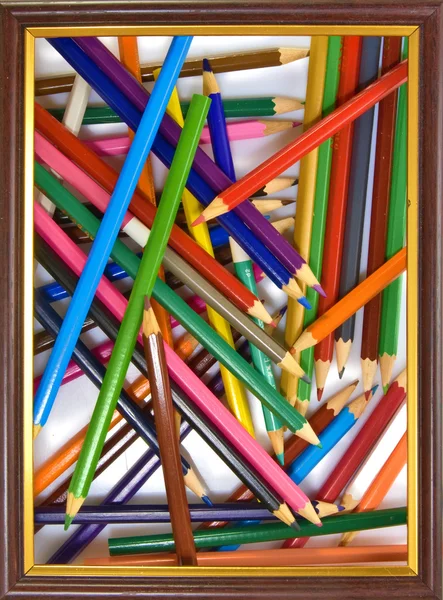 Různé barevné tužky v rámu — Stock fotografie