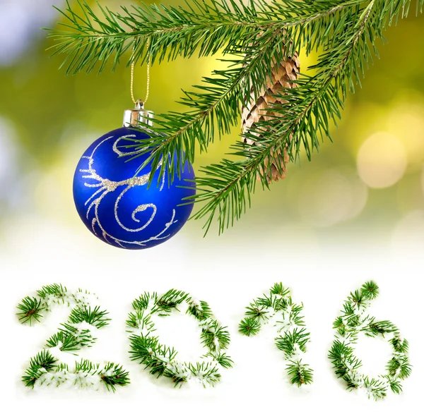 Christmas decorations on a green background close up — Stock Photo, Image