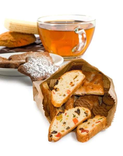 Image of a cup of tea and cookies on a white background close-up — Stock Photo, Image