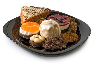 bir tabak portre üzerinde birçok lezzetli Kurabiye görüntüsünü