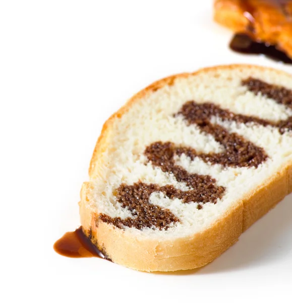 Image slice of white bread watered with liquid chocolate — Stock Photo, Image