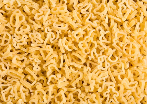 Many raw pasta close-up — Stock Photo, Image