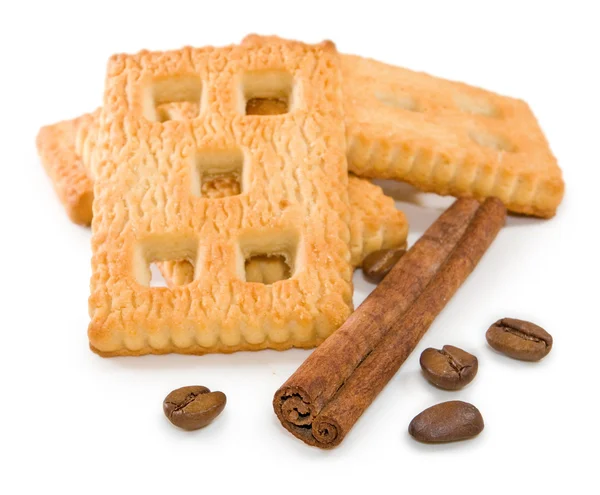 Imagen de galletas, granos de cacao y canela de cerca — Foto de Stock