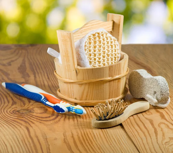 Bath accessories on wooden board close-up — Stock Photo, Image