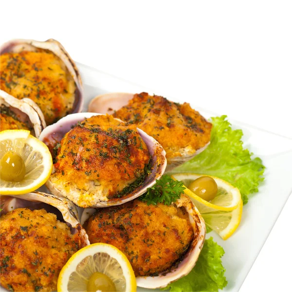 Печёные фаршированные моллюски — стоковое фото