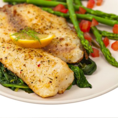 Tilapia sotelenmiş ıspanak ile