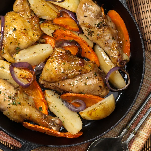 Roasted chicken thighs — Stock Photo, Image