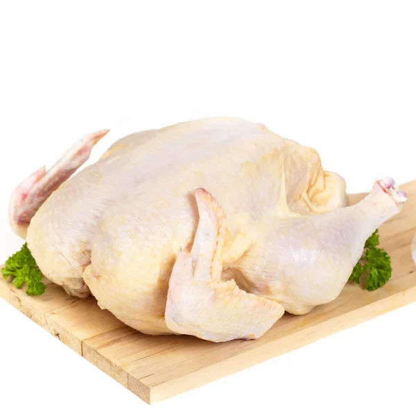 Pollo crudo intero su sfondo bianco — Foto Stock