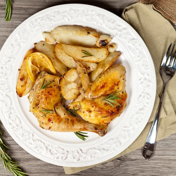 Roasted chicken thighs — Stock Photo, Image