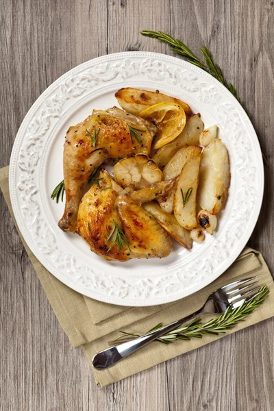 Roasted chicken thighs — Stock Photo, Image