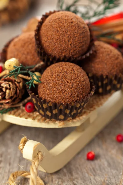 Fundo de Natal com sobremesas de chocolate — Fotografia de Stock