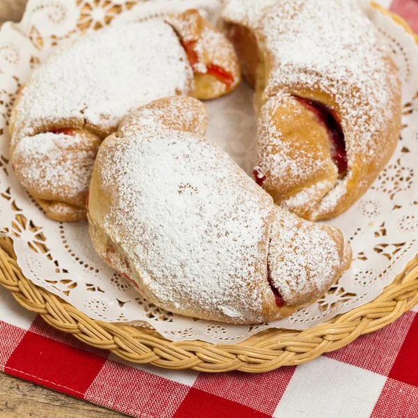 Pastry croissants filled with cherry jam — Stock Photo, Image