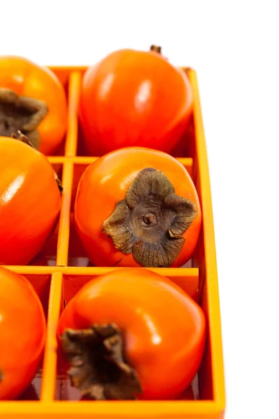 Deliciosos caquis de laranja — Fotografia de Stock