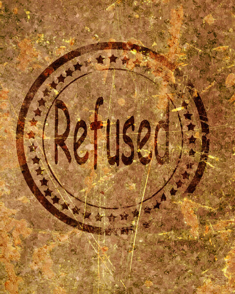 Refused stamp on a grunge background