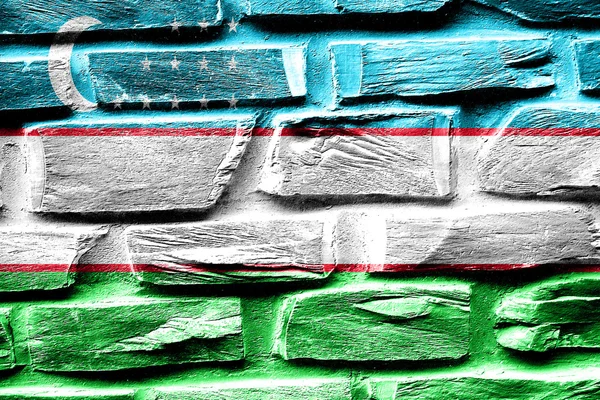 Tuğla duvar Özbekistan bayrağı bazı çatlaklar ve vintage bir görünüm — Stok fotoğraf