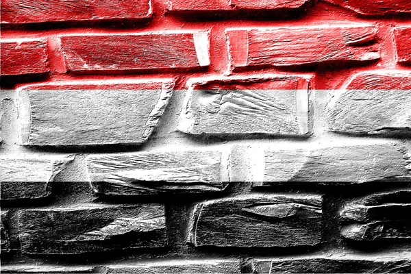 Brick wall Yemen flag with some cracks and vintage look — Stock Photo, Image
