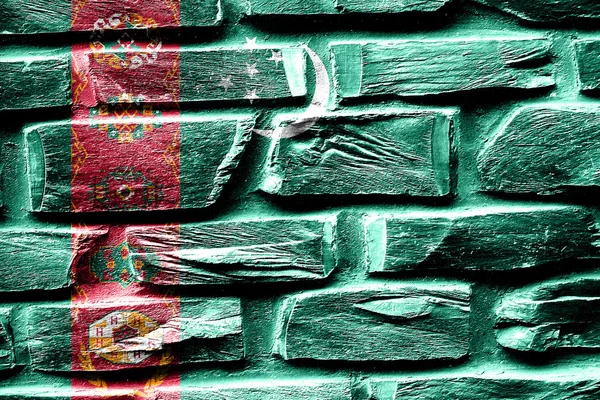 Brick wall Turkmenistan flag with some cracks and vintage look — Stock Photo, Image