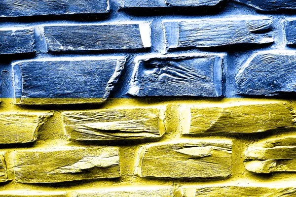 Brick wall Ukraine flag with some cracks and vintage look — Stock Photo, Image