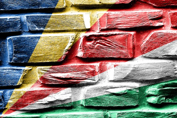 Ladrillo pared seychelles bandera con algunas grietas y aspecto vintage —  Fotos de Stock