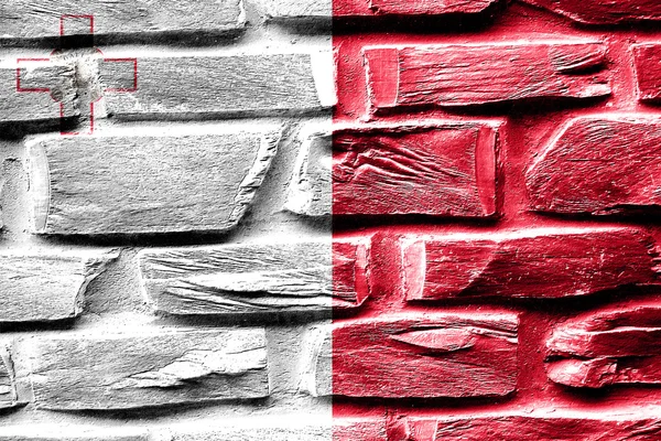 Brick wall Malta flag with some cracks and vintage look — Stock Photo, Image
