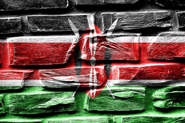Cihlová zeď Keni vlajka s některými praskliny a retro vzhled — Stock fotografie
