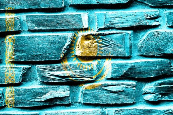 Brick wall Kazakhstan flag with some cracks and vintage look — Stock Photo, Image