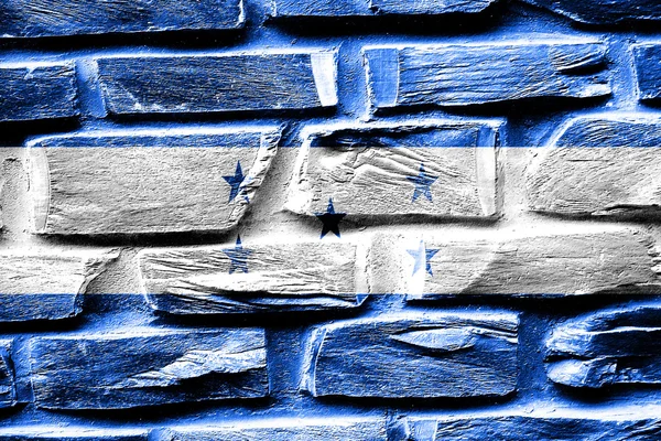 Brick wall Honduras flag with some cracks and vintage look — Stock Photo, Image