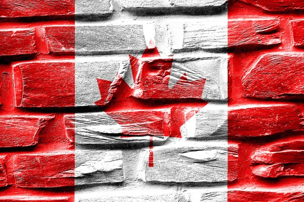 Parede de tijolo bandeira do Canadá com algumas rachaduras e olhar vintage — Fotografia de Stock