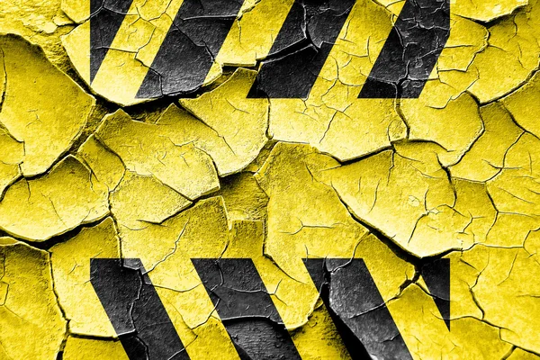 Grunge popraskané, černé a žluté nebezpečí pruhy — Stock fotografie