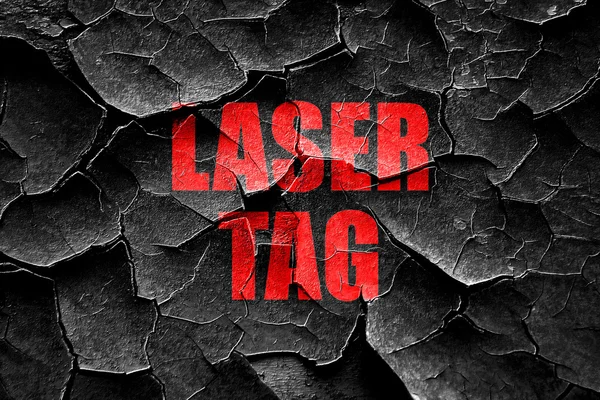 Grunge cracked laser tag sign background — Stock Photo, Image