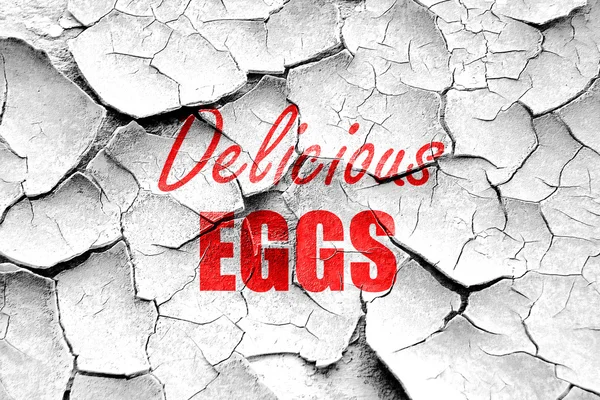 Grunge incrinato delizioso uovo segno — Foto Stock